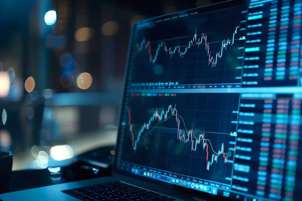 Financial stock market on a laptop screen. Stock market curve on screen. Investing in the stock market. Sotck exchange. Stock market training.
